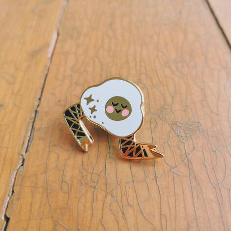 leggy egg friend enamel pin