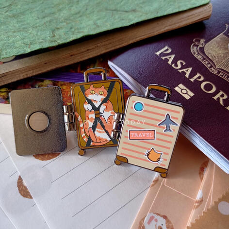 packing essentials enamel pin