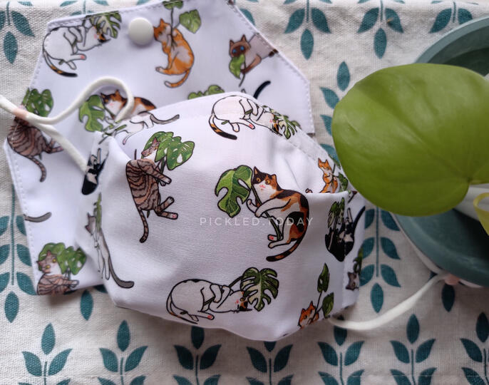 cats and monstera face mask